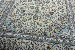 Close-up detail of 2000s Kashan rug from Iran / Persia showing Wool weave