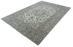 Corner detail of 2000s Kashan rug showing border pattern and Wool pile