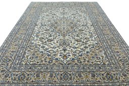Surface texture of 2000s Kashan rug with natural Wool and intricate pattern