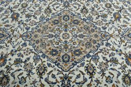 Central medallion detail of 2000s Kashan rug from Iran / Persia