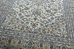 Close-up detail of 2000s Kashan rug from Iran / Persia showing Wool weave