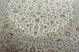 Close-up detail of 2000s Kashan rug from Iran / Persia showing Wool weave