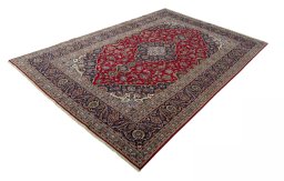 Corner detail of 2000s Kashan rug showing border pattern and Wool pile