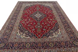 Surface texture of 2000s Kashan rug with natural Wool and intricate pattern
