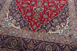 Close-up detail of 2000s Kashan rug from Iran / Persia showing Wool weave