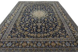 Surface texture of 2000s Kashan rug with natural Wool and intricate pattern