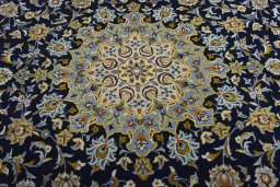 Central medallion detail of 2000s Kashan rug from Iran / Persia