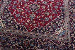 Close-up detail of 2000s Kashan rug from Iran / Persia showing Wool weave