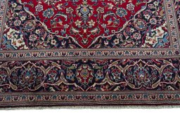 Full view of 2000s Kashan rug from Iran / Persia, 300 × 195 cm in Red tones