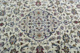 Central medallion detail of 2000s Kashan rug from Iran / Persia
