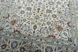 Close-up detail of 2000s Kashan rug from Iran / Persia showing Wool weave