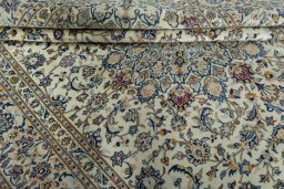 Close-up detail of 2000s Kashan rug from Iran / Persia showing Wool weave
