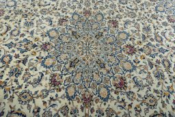 Central medallion detail of 2000s Kashan rug from Iran / Persia