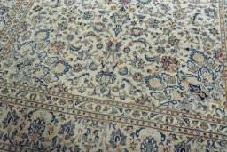 Close-up detail of 2000s Kashan rug from Iran / Persia showing Wool weave