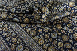 Surface texture of 2000s Kashan rug with natural Wool and intricate pattern