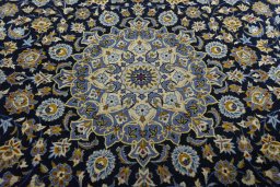 Central medallion detail of 2000s Kashan rug from Iran / Persia