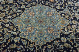 Central medallion detail of 2000s Kashan rug from Iran / Persia