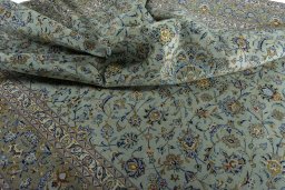 Surface texture of 2000s Kashan rug with natural Wool and intricate pattern