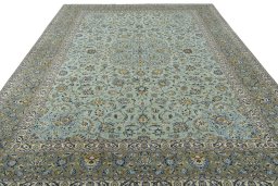 Surface texture of 2000s Kashan rug with natural Wool and intricate pattern
