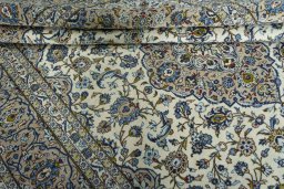 Close-up detail of 2000s Kashan rug from Iran / Persia showing Wool weave