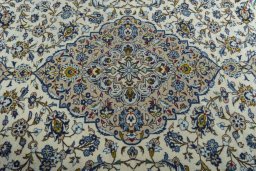 Central medallion detail of 2000s Kashan rug from Iran / Persia