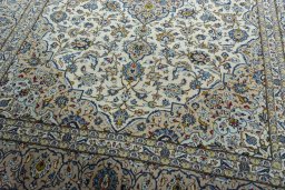 Close-up detail of 2000s Kashan rug from Iran / Persia showing Wool weave