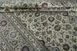 Close-up detail of 2000s Kashan rug from Iran / Persia showing Wool weave