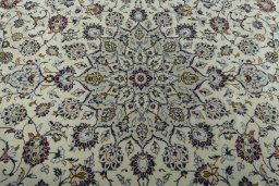 Central medallion detail of 2000s Kashan rug from Iran / Persia