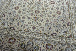 Close-up detail of 2000s Kashan rug from Iran / Persia showing Wool weave