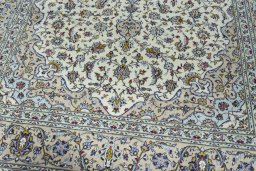 Close-up detail of 2000s Kashan rug from Iran / Persia showing Wool weave