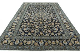 Surface texture of 2000s Kashan rug with natural Wool and intricate pattern