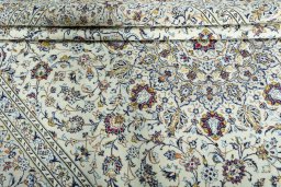 Close-up detail of 2000s Kashan rug from Iran / Persia showing Wool weave