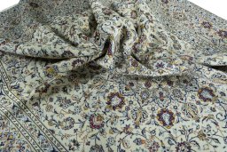 Surface texture of 2000s Kashan rug with natural Wool and intricate pattern