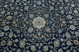 Central medallion detail of 2000s Kashan rug from Iran / Persia