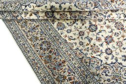 Close-up detail of 2000s Kashan rug from Iran / Persia showing Cork weave