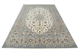 Surface texture of 2000s Kashan rug with natural Cork and intricate pattern
