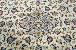 Central medallion detail of 2000s Kashan rug from Iran / Persia