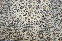 Close-up detail of 2000s Kashan rug from Iran / Persia showing Cork weave