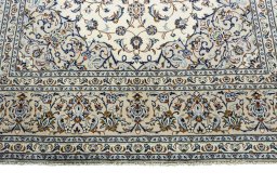 Full view of 2000s Kashan rug from Iran / Persia, 301 × 200 cm in Beige tones