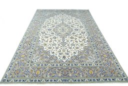 Surface texture of 2000s Kashan rug with natural Wool and intricate pattern