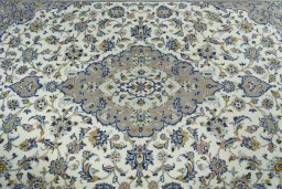 Central medallion detail of 2000s Kashan rug from Iran / Persia