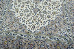 Close-up detail of 2000s Kashan rug from Iran / Persia showing Wool weave