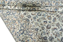 Close-up detail of 2000s Kashan rug from Iran / Persia showing Wool weave