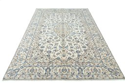 Surface texture of 2000s Kashan rug with natural Wool and intricate pattern