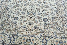 Close-up detail of 2000s Kashan rug from Iran / Persia showing Wool weave