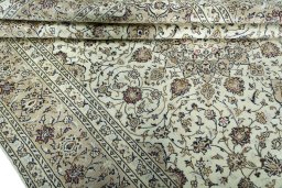 Close-up detail of 2000s Kashan rug from Iran / Persia showing Wool weave