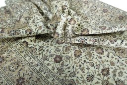 Surface texture of 2000s Kashan rug with natural Wool and intricate pattern