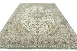 Surface texture of 2000s Kashan rug with natural Wool and intricate pattern