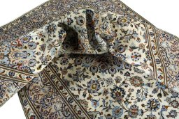 Surface texture of 2000s Kashan rug with natural Wool and intricate pattern