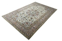 Corner detail of 2000s Kashan rug showing border pattern and Wool pile